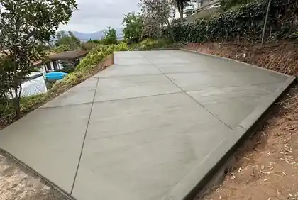 Fresh concrete driveway after installation